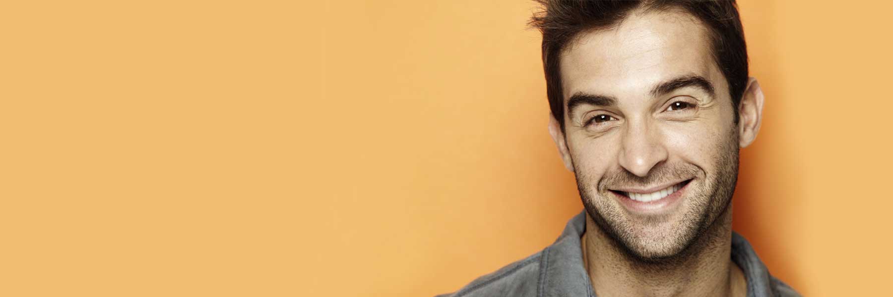 Person Smiling at the camera after recieving painless sedation dentistry