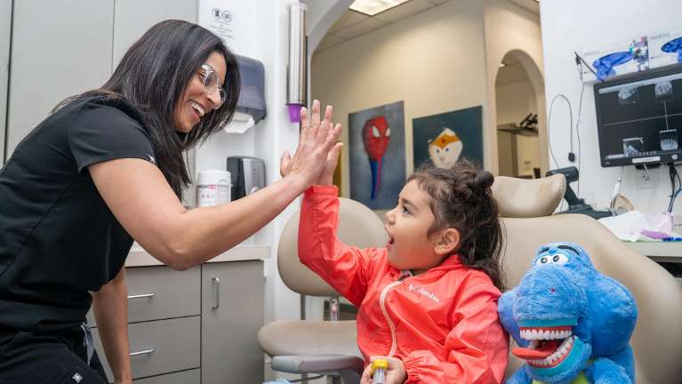 Young girl after meeting with her children's dentist in Fort Worth, Texas